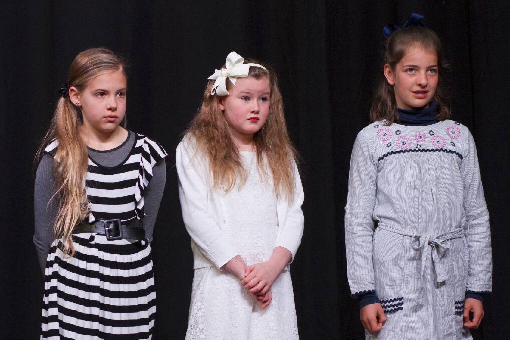 These three talented local pianists, Matilda, Daina and Grace took out all three placings in their section and are pictured listening intently to the adjudicator. Picture: PETER PICKERING.