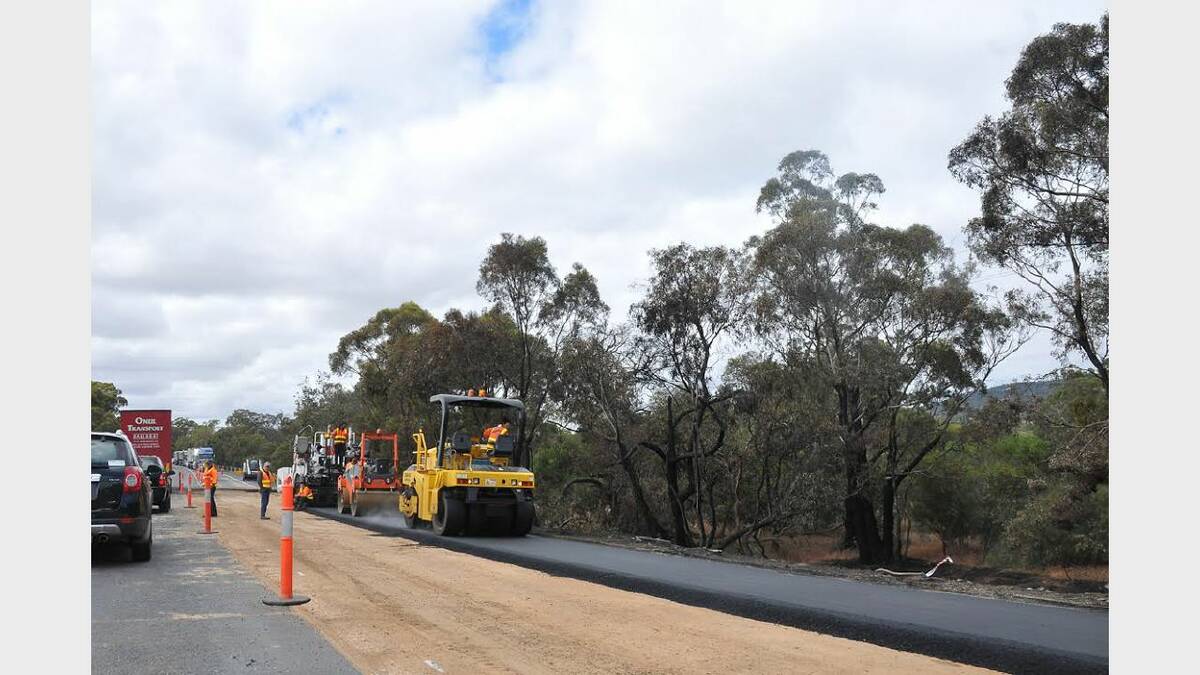 Works are being undertaken to repair the bitumen badly damaged in the fiery crash. Pictures: BEN KIMBER
