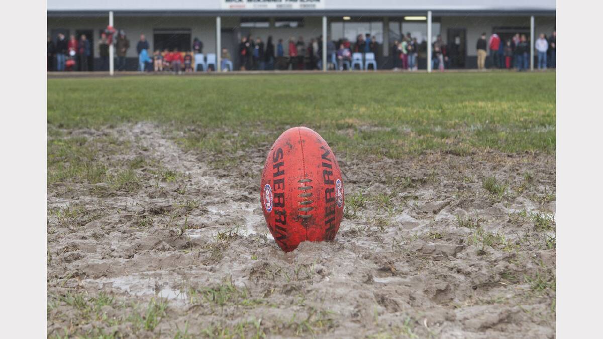 The grand final was played in wet and muddy conditions