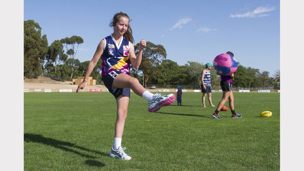 Lily Dowling gets a kick away during training as the Ararat Storm Football Club looks to make an even bigger impact in season 2014.