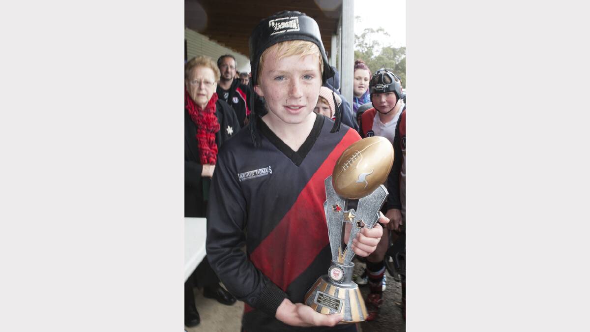 Cooper Heard with the Jack Costello Goal Kicking trophy
