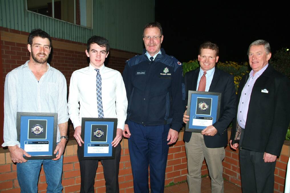 Former Richmond premiership player and Victorian Police offi cer Emmett Dunne (centre) and Terry Weeks (far right) from the Ararat branch of the Blue Ribbon Foundation with Blue Ribbon Spirit of Football award winners Sean McDougall from Tatyoon (Under 16 coach of the year), James Keys from Wickliffe/Lake Bolac (Under 16 player of the year) and Pat Millear from Wickliffe/Lake Bolac (Under 16 umpire of the year).